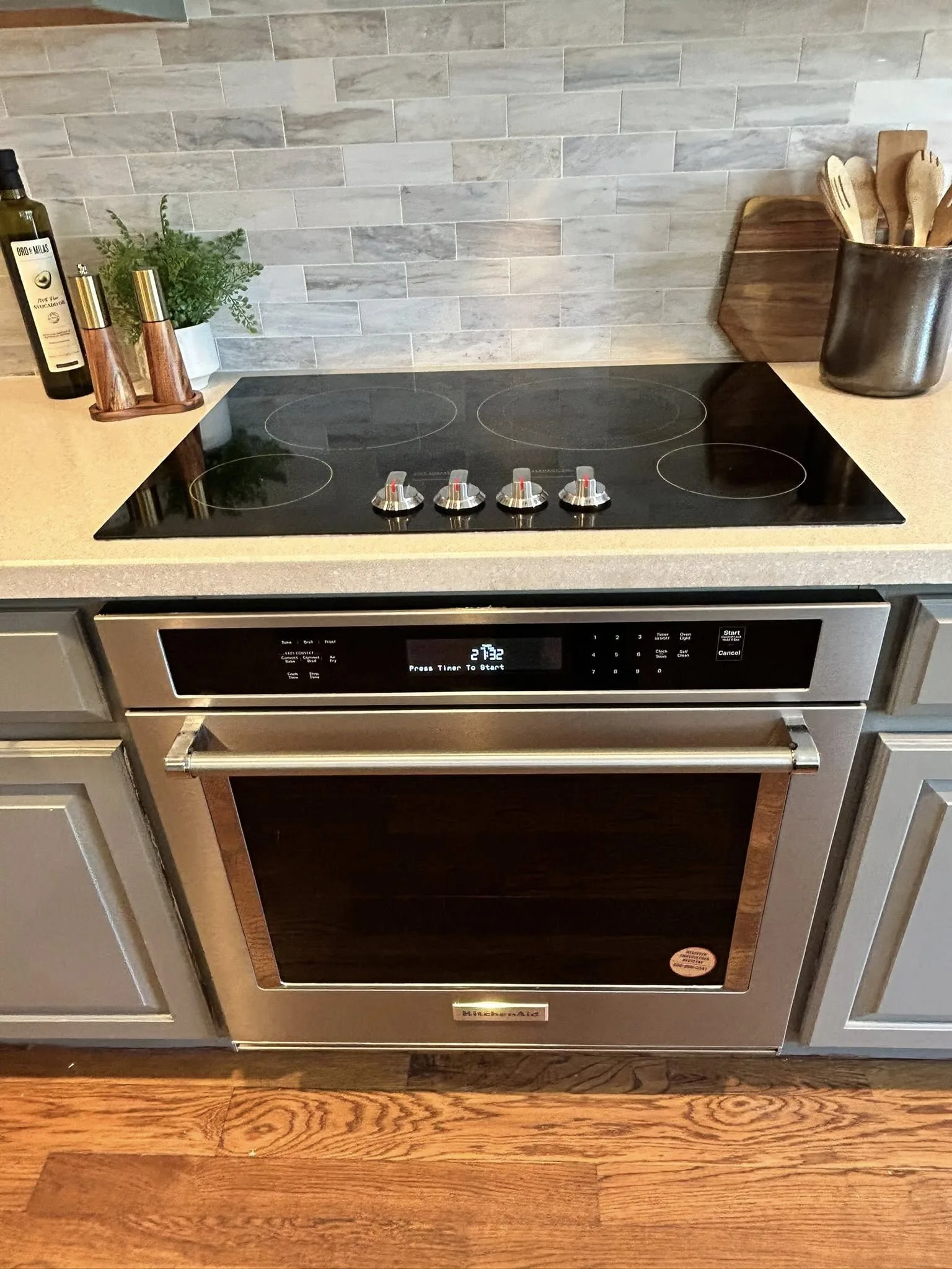 Clean cooktop and wall oven kept fresh with recurring cleaning
